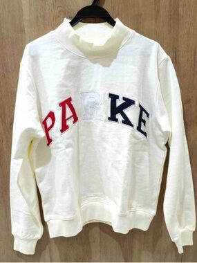 PARKE Women's Mock Neck Sweatshirt in Cream with Red and Blue Lettering
